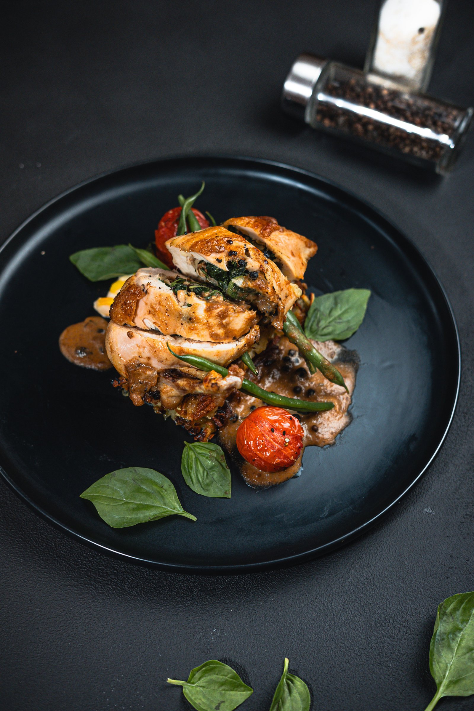 Spinach-stuffed chicken breast with peppercorn sauce